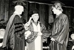 1981 College of Boca Raton Commencement: Clarence Smith presents degree to grandson by Lynn University