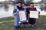 1992 Lynn Commencement: Drs Ross and Mahoney present honorary degree to Mary Rose Main by Lynn University