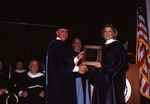 1992 Lynn Commencement: J. Donald Wargo presents the President's Award to Leslie Alice Kent by Lynn University