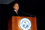 1999 Lynn Commencement: Speaker Ken Bode at podium by Lynn University