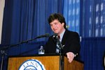 Tucker Carlson at podium by Lynn University