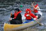 Founders Day 2010: Students in costume paddle to shore by Joe Carey